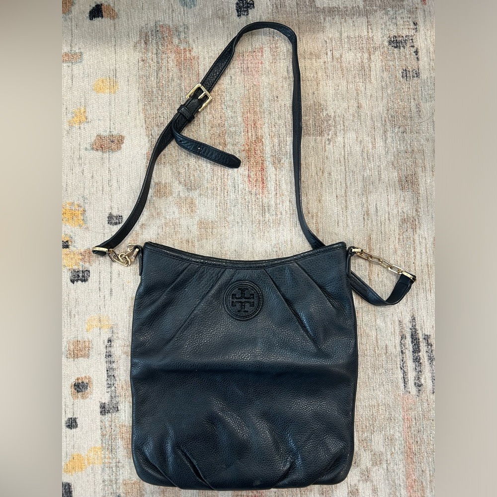 Tory Burch black leather bucket bag in good condition
